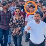 কিশোর গ্যাং লিডারের সঙ্গে ছাত্রদল নেতার ভিডিও ভাইরাল 2 কুমিল্লায় মিছিলে মহানগর ছাত্রদল নেতা মো. মহসিনের পেছনে কথিত কিশোর গ্যাং লিডার রতনকে দেখা যায়—ভাইরাল ভিডিও থেকে নেওয়া ছবি।